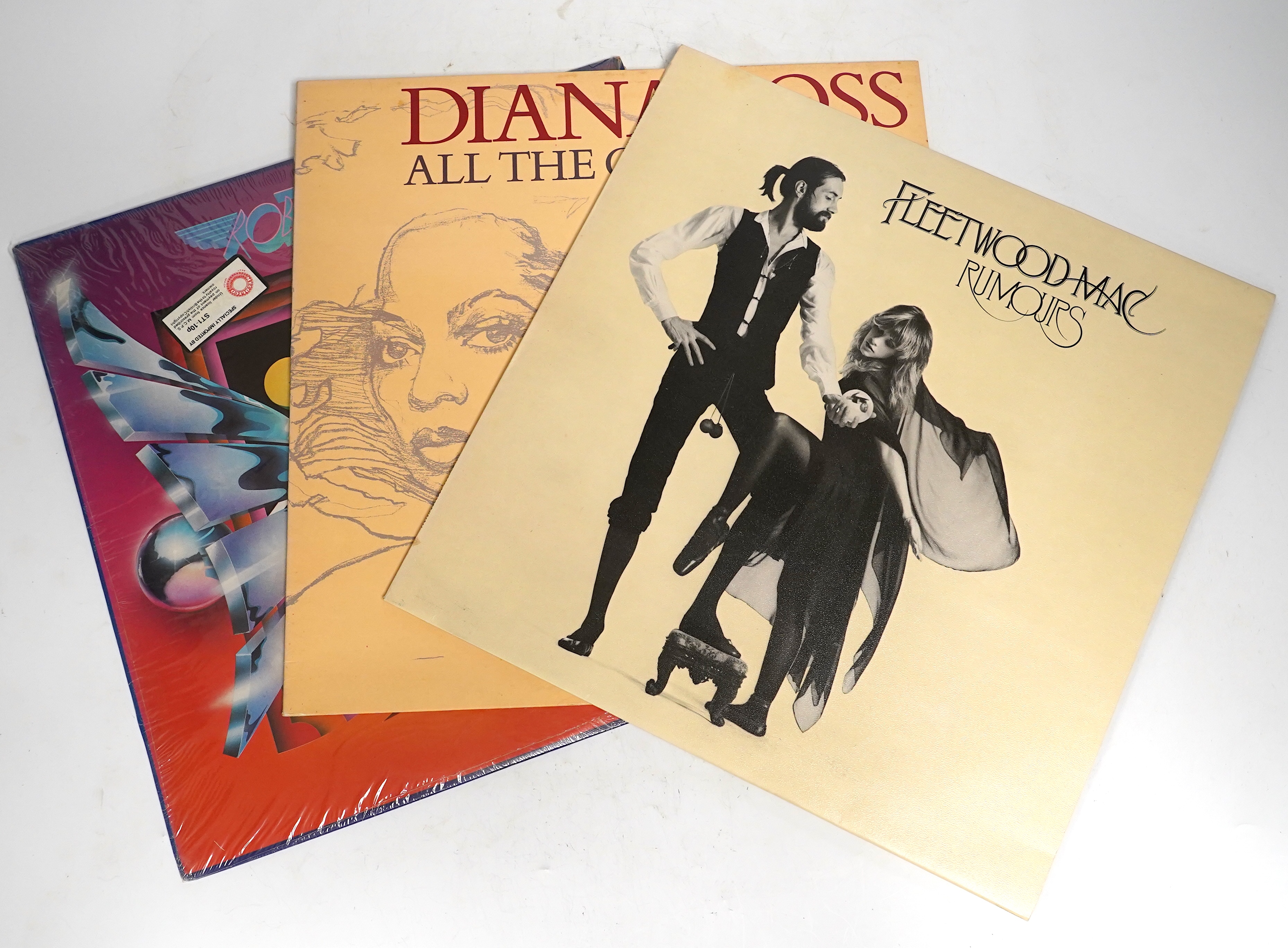 Thirty-seven LP record albums, artists including; Fleetwood Mac, Diana Ross, U2, Vangelis, Joni Mitchell, Jethro Tull, etc. together with nineteen 12” singles